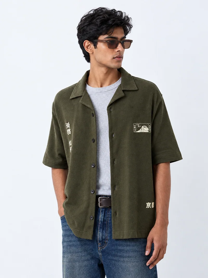 Olive overshirt fashion look on Indian-looking model